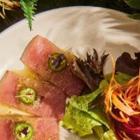 Tuna Thai Herb Carpaccio · Gluten free. Fresh sashimi-grade tuna, lemongrass, red onion, cilantro, culantro, mint, ging...
