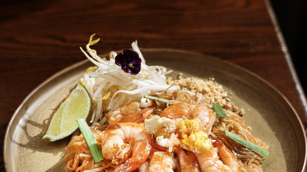 Pad Thai · Stir-fried rice noodles, chives, egg, bean sprouts, crushed peanuts, house-made pad Thai sauce.