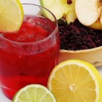 Cold Brew Hibiscus Tea · Organic hibiscus flower cold brew with apple, pear, lemon. Slightly sweet.