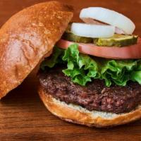 6Oz Beef Burger  · 6oz Beef Burger topped with white American cheese, lettuce, tomatoes, raw onions, pickles, k...