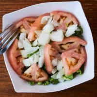Side Salad · Lettuce, tomatoe and onions. You can add toppings to create your own salad