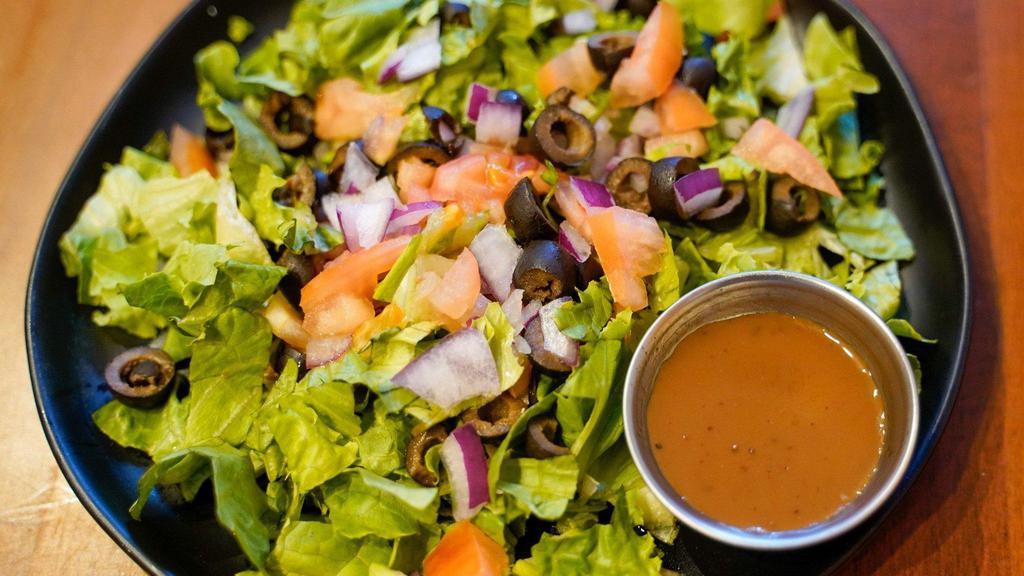 Sweet Teriyaki Salad  · Lettuce, tomatoes, onions , sweet peppers, olives and grilled chicken tossed in our homemade sweet teriyaki sauce topped with sesame seeds.