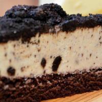 Oreo Cookie Mousse Cake · A delicious mousse cake filled and topped with Oreo cookies.