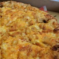 Chicken Wing Pizza · Buffalo wing sauce topped with mozzarella, chicken and cheddar cheese, served with bleu chee...