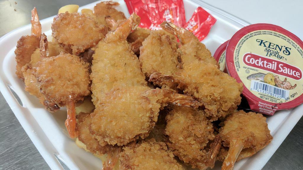 Breaded Shrimp Dinner · Coated with seasoned breading. Comes with Macaroni salad, french fries and choice of sauce