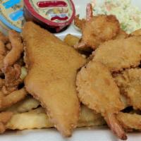 Seafood Combo · Served with fish, fried clams, shrimp, fries, tarter sauce, cocktail sauce and coleslaw.