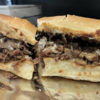 Timmy 2 Shoes Sausage And Steak Slammer Sub · Our world famous steak served with Italian sausage, mozzarella, mayo and Italian dressing. 1...