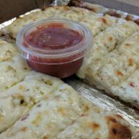 Bread Stix With Mozzarella Cheese And Dipping Sauce · 
