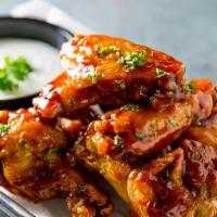 Cantina Wings · Crispy, yet Juice jumbo party wings smoother in your choice of sauce or have them naked..
