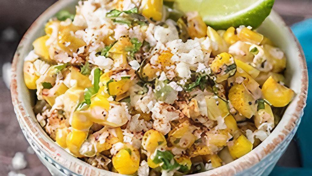 Esquites Al Fresco · Our version of Mexican Street corn served off the cobb in a bowl. Roasted corn and onions smothered in our chipotle mayo and cotija cheese topped with cilantro crema.