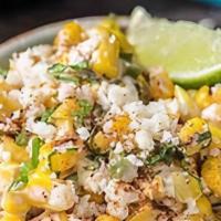 Esquites Al Fresco · Our version of Mexican Street corn served off the cobb in a bowl. Roasted corn and onions sm...