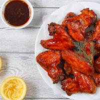 Honey Bbq Chicken Wings · Exquisite mixture of honey and bbq sauce topped on oven-baked chicken wings.