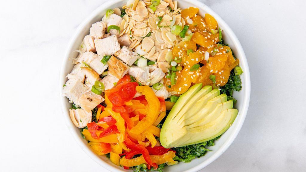 Sesame Chicken Salad · Chopped kale, marinated chicken, mandarin oranges, avocado, sliced peppers, roasted almonds, green onions, sesame seeds, and creamy sesame dressing (served on the side). (Gluten-free)