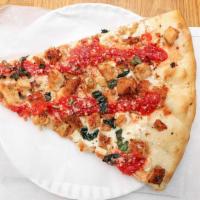 Margharita Pizza Slice · Fresh mozzarella, tomato sauce, basil, and olive oil.
