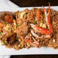 Arroz Con Mariscos · Asian-Peruvian-style fried rice and eggs with mixed seafood.