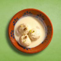 Real Rasmalai · Dessert consisting of soft village cheese patty immersed in chilled creamy milk.