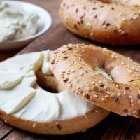 Fresh Bagel With Cream Cheese · Customer's choice of fresh bagel. Served in customer's preference of style with a side of cr...