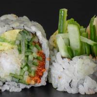 Spider Roll · Tempura kani, avocado, cucumber, topped with caviar, sweet sauce and spicy mayo.