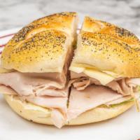 Turkey Supreme · Turkey, melted cheese, and bacon with Russian dressing on a toasted hero.