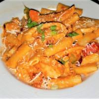 Chicken Riggies · Peppers, onions, spicy pink sauce.