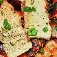 Cioppino · The San Francisco Favorite; clams, mussels, calamari, shrimp, scallops, and fresh fish. Saut...