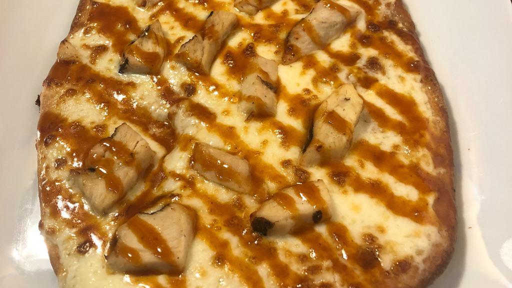 Chicken Wing · Bleu cheese sauce, whole milk mozzarella cheese, grilled chicken with your choice of hot, medium or mild sauce.