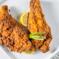 Fried Catfish Dinner · Comes with two pieces of fish and your choice of two sides.