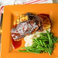 Blackened Pork Chops · Pan seared, topped with Asian bbq sauce and grilled pineapple, served with mashed potato and...