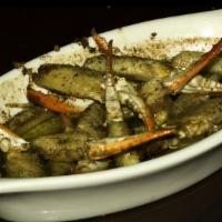 Crab Fingers · Gluten-free. No cracking required Louisiana crab fingers sautéed in garlic butter, served wi...
