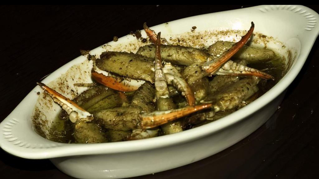 Crab Fingers · Gluten-free. No cracking required Louisiana crab fingers sautéed in garlic butter, served with bread to dunk. Gluten-free no bread.
