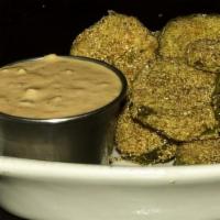 Fried Pickles · Gluten-free, dairy-free. Sliced dill pickles, dusted with seasoned cornmeal, fried crisp, se...