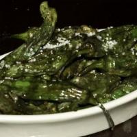 Shishito Peppers · Gluten-free, dairy-free, and vegan. Blistered, drizzled with truffle oil, and dusted with pr...