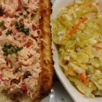 Lobster Roll · Live lobster steamed in a wine, champagne, butter, garlic broth. De-shelled, coarsely choppe...