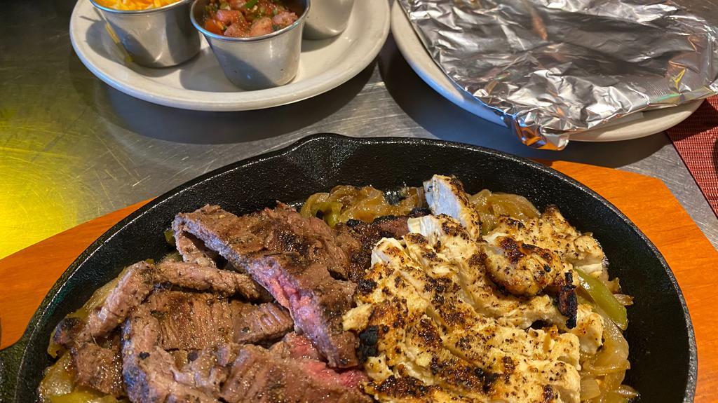 Fajitas · Grilled steak, chicken and/or shrimp with sauteed onions, green bell peppers. Served with flour tortillas, Mara's guacamole, pico de gallo (Texas salsa), cheddar cheese and sour cream.