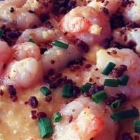 Shrimp Grits · Gluten-free. Cheese grits topped with Gulf shrimp sautéed in garlic butter garnished with ch...