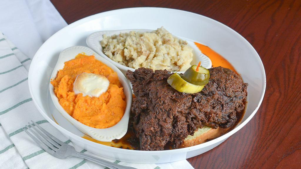 Nashville Hot Chicken · Buttermilk, creole seasoned and marinated, then deep fried dark chicken (large leg and thigh), served regular spicy or extra hot over Texas toast with choice of two sides.