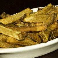 French Fries - Hand Cut · Hand cut Idaho potatoes, fried to order.