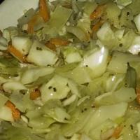 No-Mayo Cole Slaw · Gluten-free, dairy-free, and vegan. Hand-cut cabbage, shredded carrot and onion in an oil an...