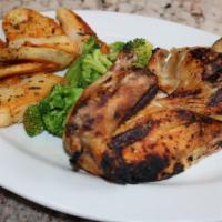 Roast Chicken · 1/2 Chicken with Roasted Potatoes and Broccoli.