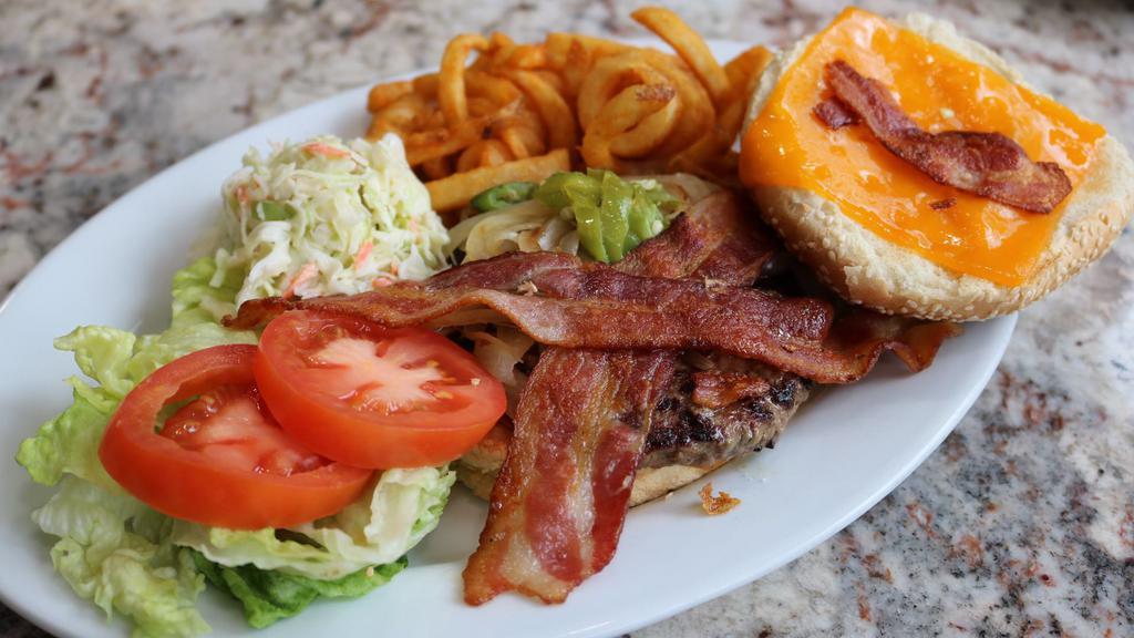 Chebi Burger · Jalapenos, grilled onions, bacon and cheddar cheese. Served with Curly Fries.