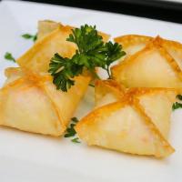 A3 Crab Rangoon (4) · Fried wonton filled w/ crab meat and cream cheese.