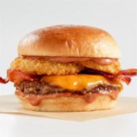Smokehouse Burger · Thick-cut applewood smoked bacon, crispy sourdough onion rings, Wisconsin cheddar cheese and...