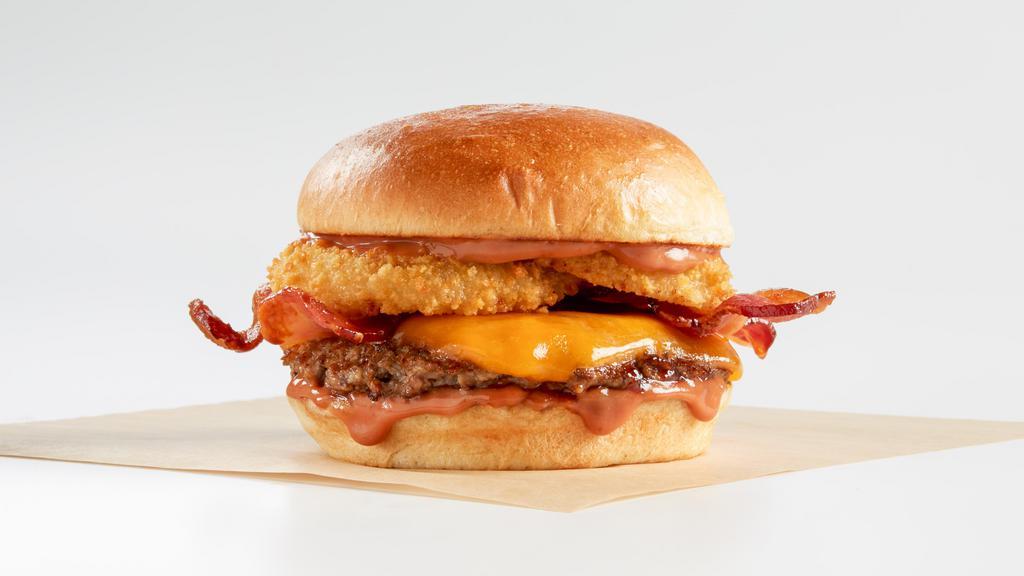 Smokehouse Burger · Thick-cut applewood smoked bacon, crispy sourdough onion rings, Wisconsin cheddar cheese and our special recipe smokehouse BBQ ranch. (This Item Is A La Carte)