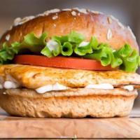 Grilled Chicken Breast Sandwich · Grilled chicken breast, iceberg lettuce, fresh tomato and mayonnaise on a grilled bun.