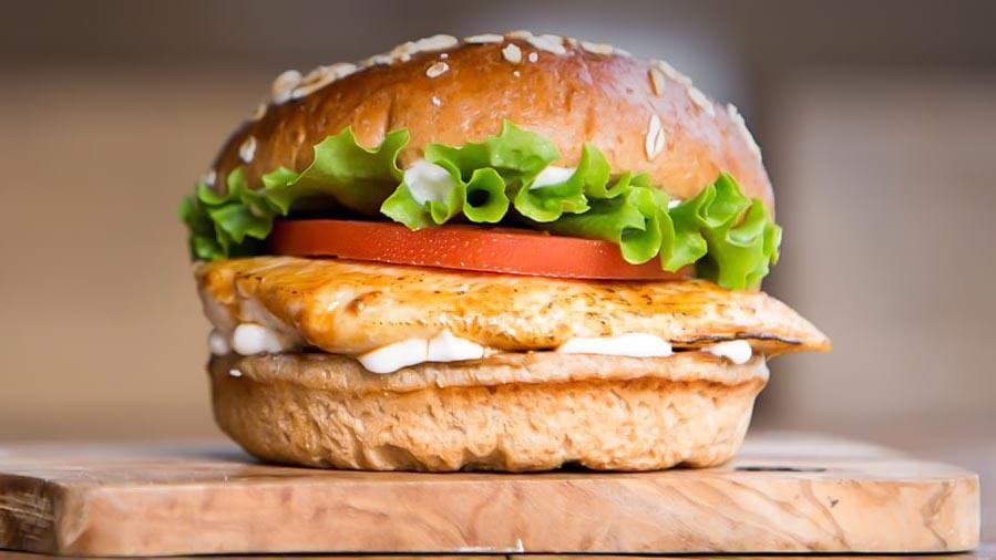 Crispy Chicken Sandwich · Crispy Chicken Tender, crisp leaf lettuce, fresh tomato, and mayonnaise on a whole wheat bun. (This Item Is A La Carte)