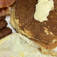 Mountain Breakfast · 3 Pancakes, 2 eggs, 3 Strips of bacon, Pork sausage links.