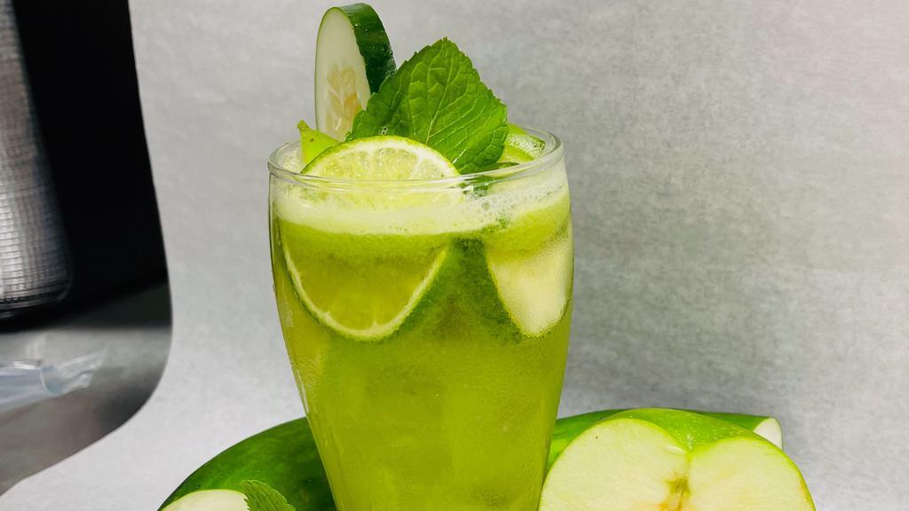 Green Lemonade · Lemons, Ice, Brown Sugar, Cucumber, Green Apples, and Mint Leaves.