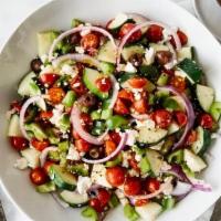 Greek Salad · Fresh romaine lettuce, feta cheese, cherry tomatoes, sliced black olives, cucumber and fresh...