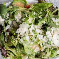 Millie'S House Salad · Grape tomatoes, homemade mozzarella, arcadian mix, parmigiano reggiano tossed in a balsamic ...