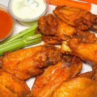 7 Regular Wings · Choice of sauce with celery & carrots & bleu cheese.
